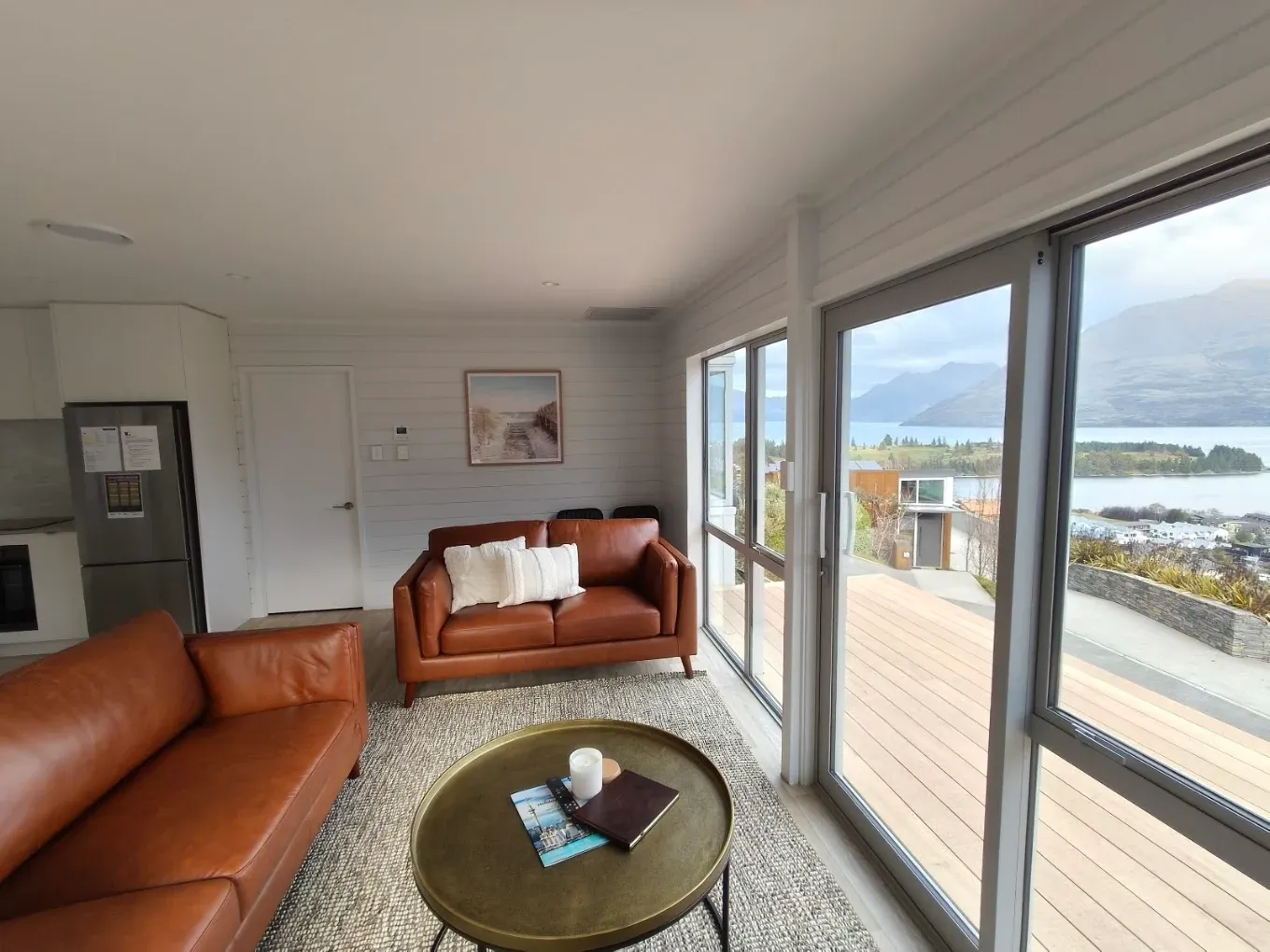 Open living and kitchen area with lake view